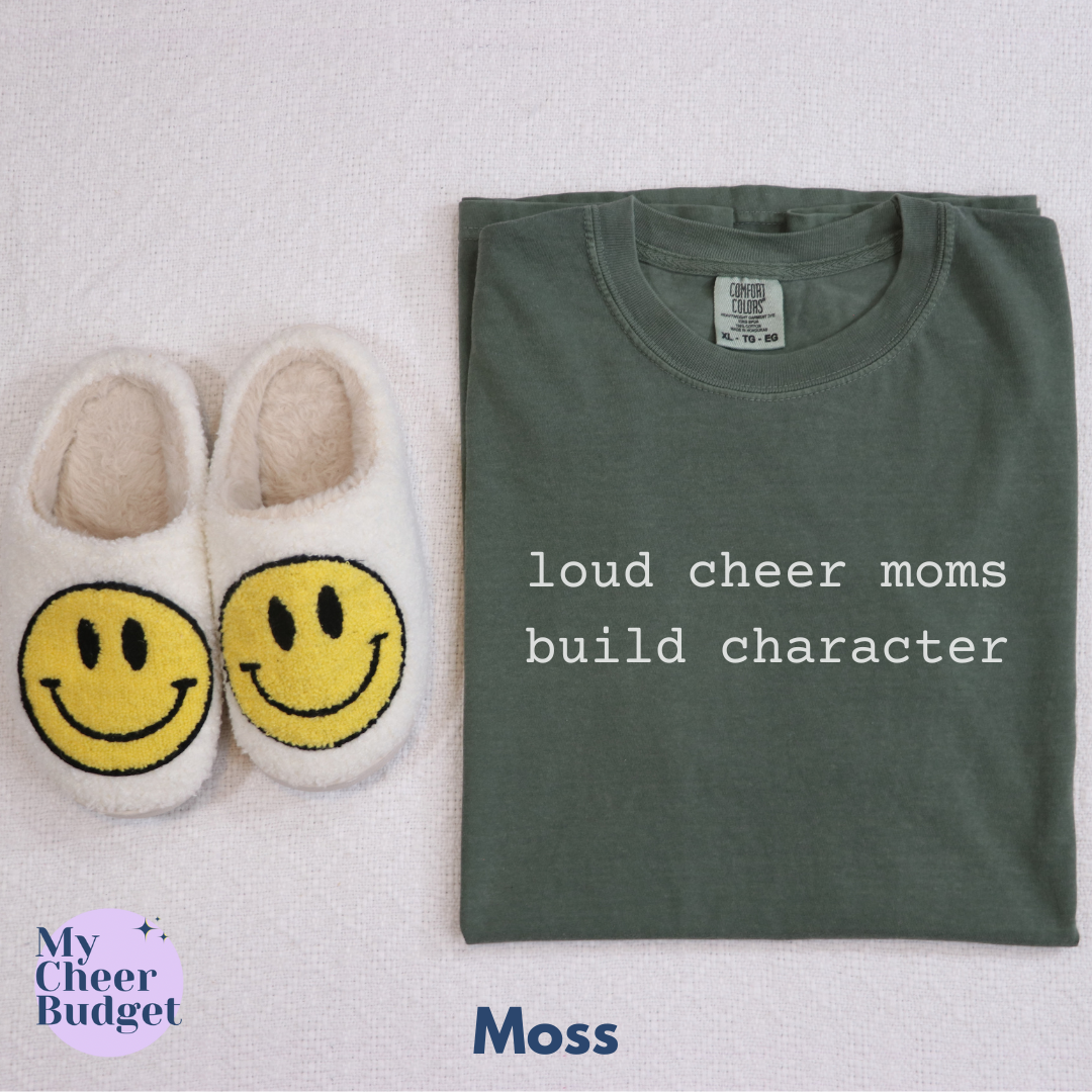 green t-shirt with white text 'loud cheer moms build character'