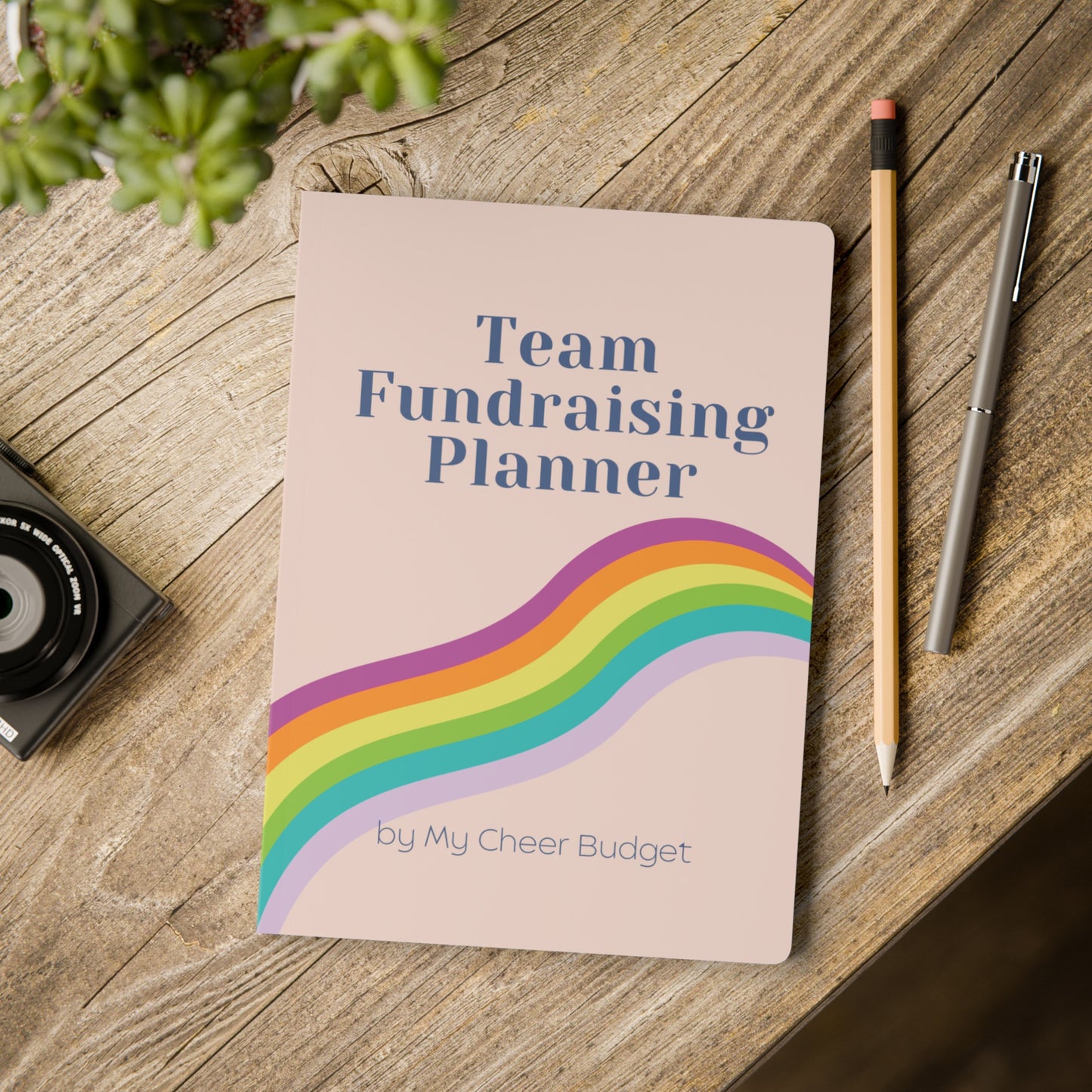 Cute pink 5.75 x 8 inch fundraising planner for travel sports