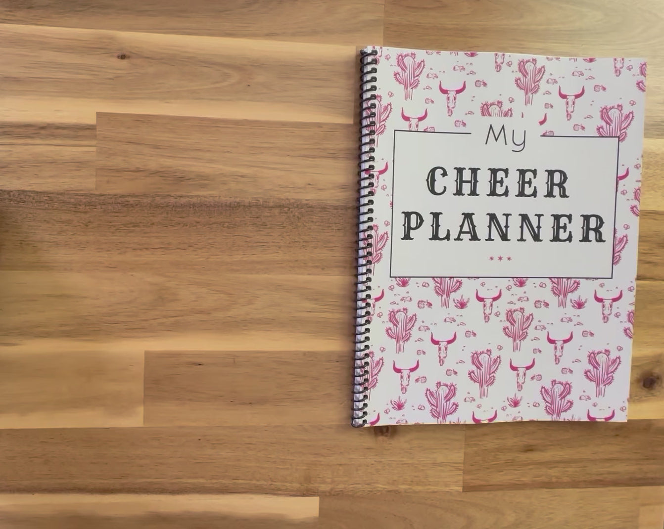 Spiral bound undated planner for cheer moms with cowgirl theme 